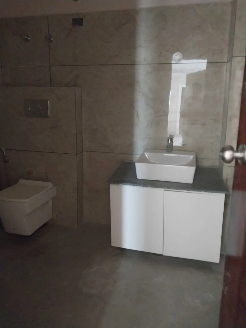 Bathroom vanity with vessel basin