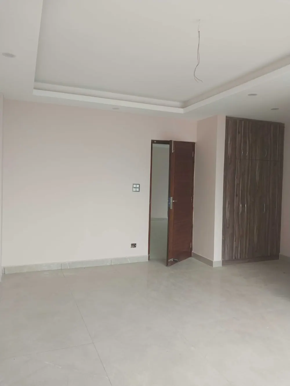 Room with wardrobe and door