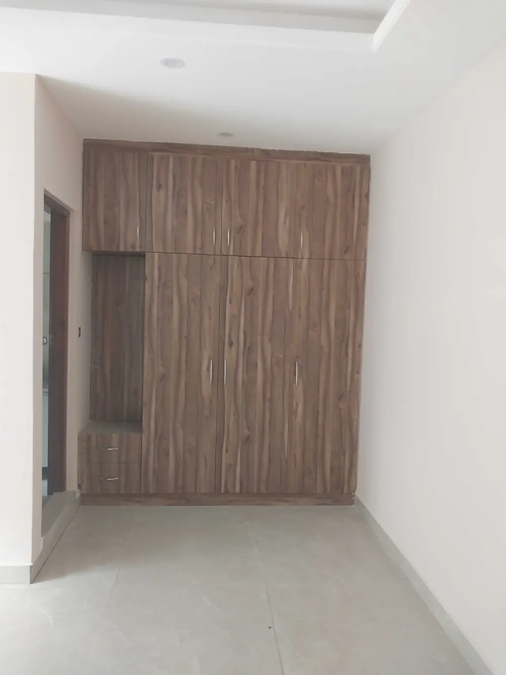 Floor-to-ceiling built-in wardrobe